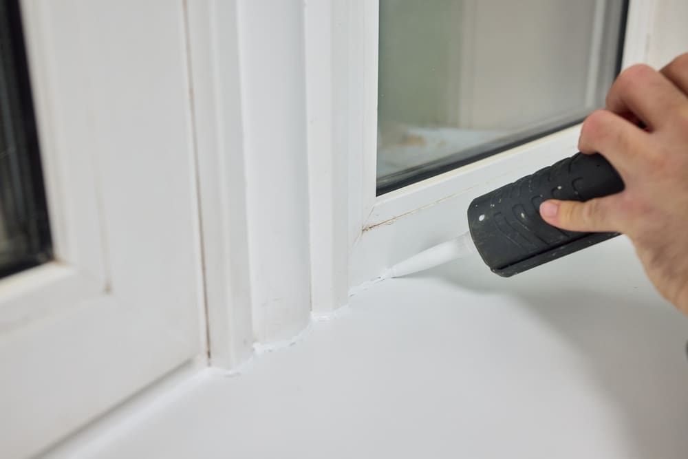Sealing,The,Corners,Of,Windows,With,Caulk,For,Achieving,A